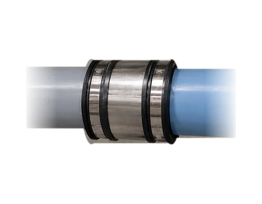 Fernco Chemical Coupling joining gray and blue chemical waste pipe