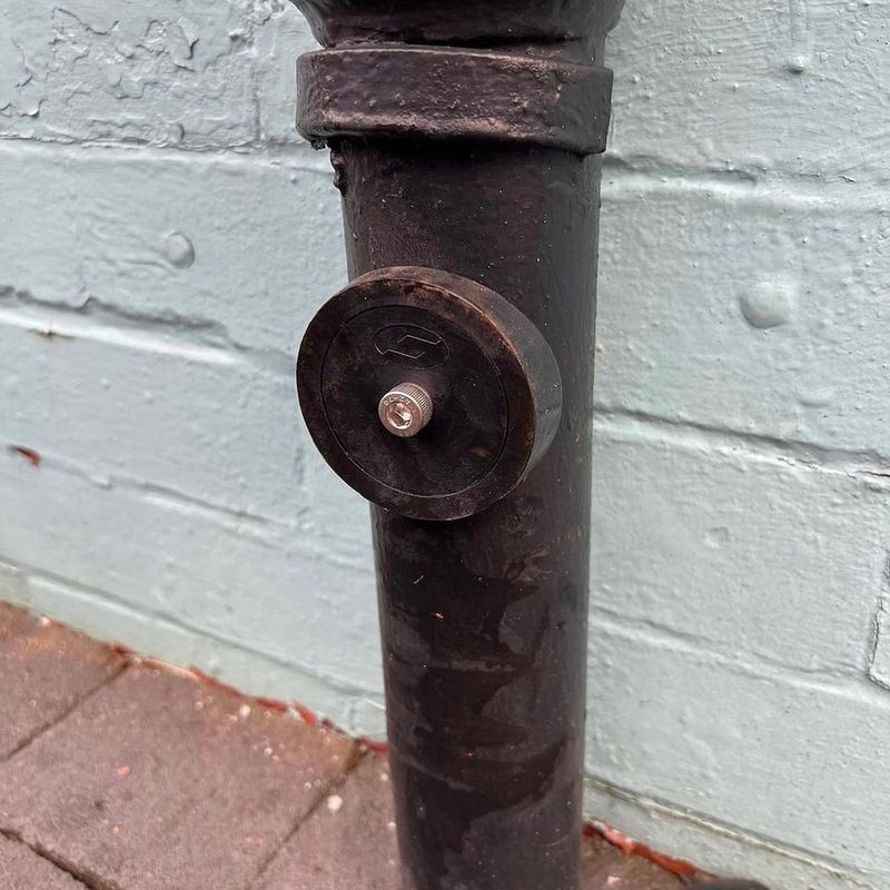 Access Point installed on a vertical cast iron pipe