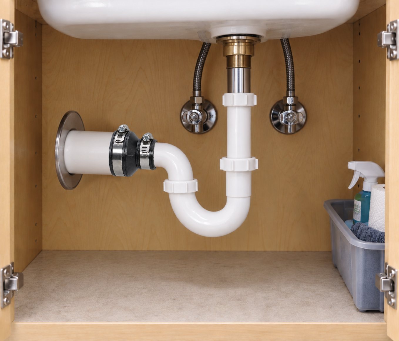 Fernco drain and trap connector installed under a sink