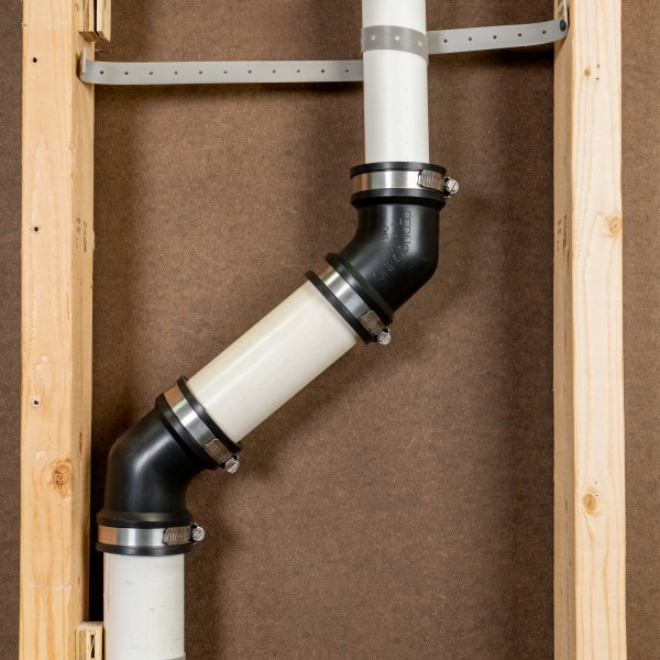 Fernco 45 degree Qwik Ell installed in an above-ground DWV system